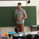 male teacher smiling