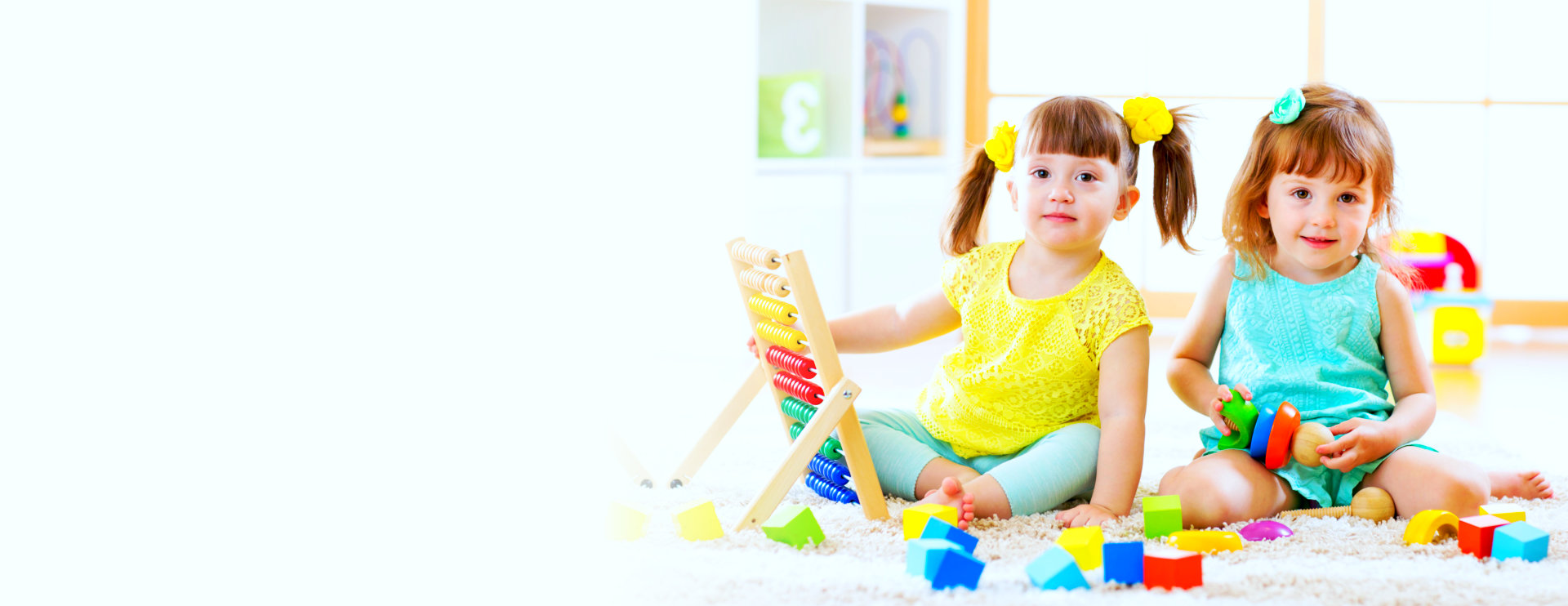 female toddlers playing